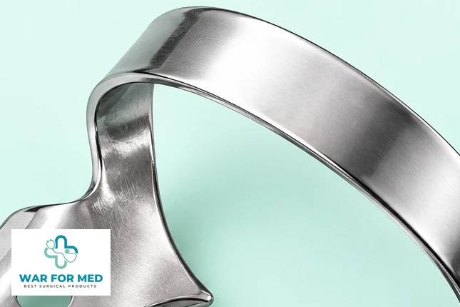 Molar Rubber-Dam Clamp — single instrument detail view reference, WAR FOR MED